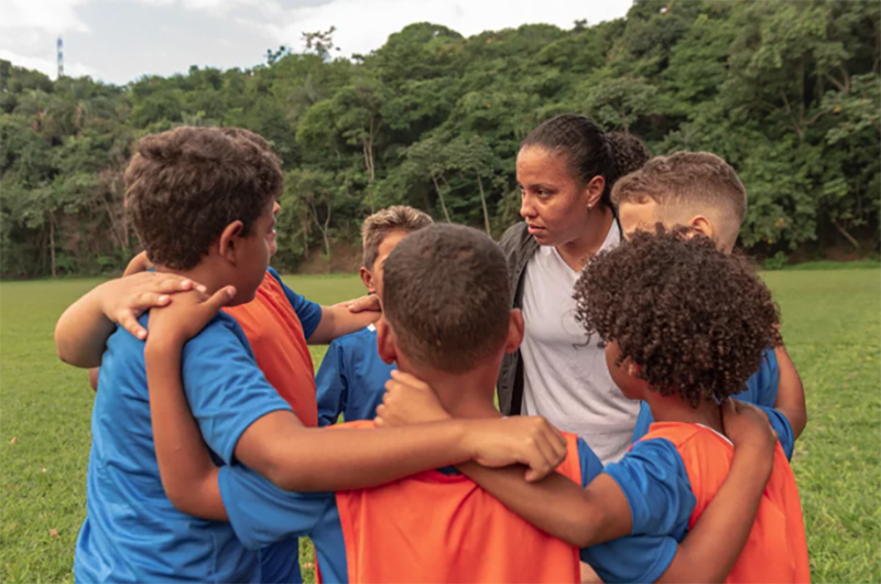 Canva AI stock photo of a coach and some kids